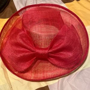 Pink hat with big bow in the front